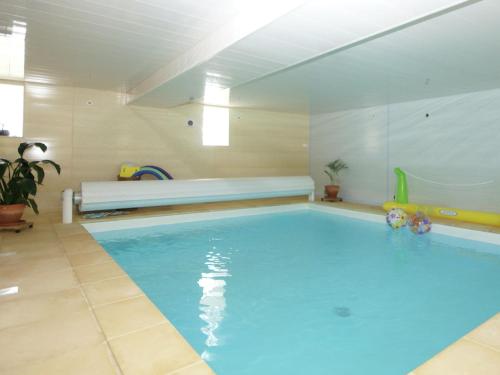 Peaceful holiday home with heated pool