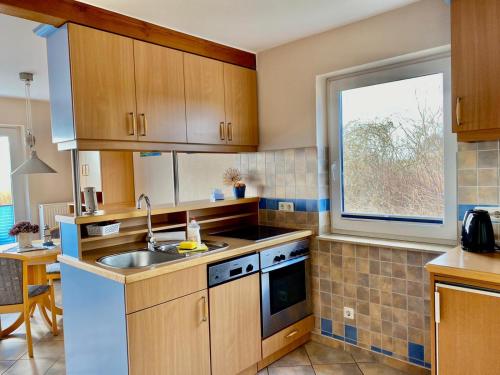 keuken, Ferienhaus am Schilf Neeberg in Krummin