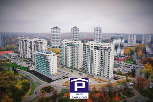 Vista Exterior, 12 PIĘTRO osiedle Nowe Tysiąclecie- super widok z okna- extra zadbane mieszkanie- parking w hali (APARTAMENT WSROD 1000cy SWIATEL - prywatny parking - duzy balkon - piekny widok noca na panorame Tys) in Osiedle Tysiaclecia