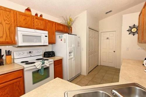 #480-Fabulous 3 bed villa with south facing pool and great privacy in Davenport, USA