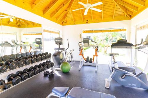 Fitness center, Luxurious 2-Bedroom Retreat with Resort-Style Amenities in Richmond Estates in Priory
