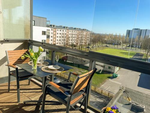 Sea and city view apartment with sauna, balcony and fireplace