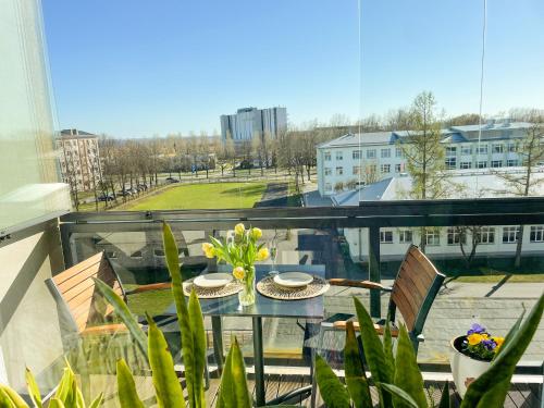 Sea and city view apartment with sauna, balcony and fireplace