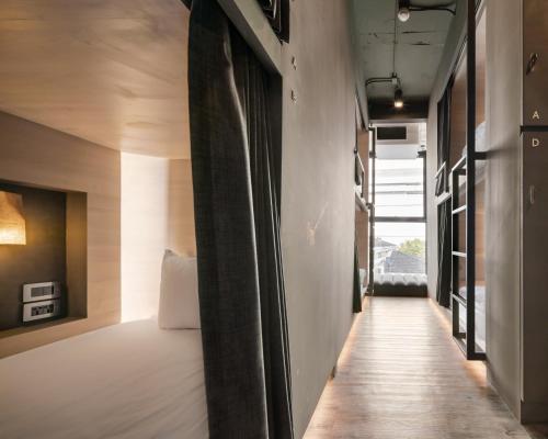 Bed in 6-Bed Mixed Dormitory Room room in Speck Bangkok