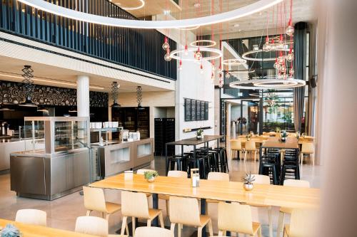 Restaurant, Coreum Hotel in Riedstadt