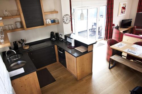 廚房, Appart'hôtels La Maison du Tigre (Appart'hotels La Maison du Tigre) in 斯蒂澤姆奧方內姆