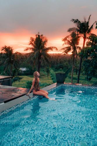 Swimming pool, Lexias Hostel and Workspace Siargao in Siargao Island