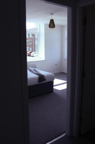 Homely 1Bed Apt easy transport links Manchester CC in Heywood