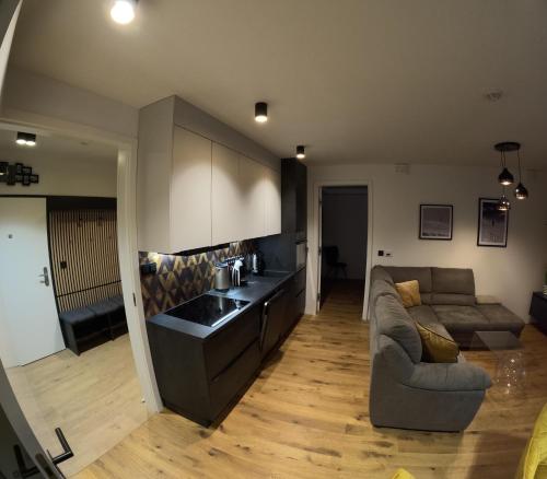 Luxusní apartmán GRAND v centru Harrachova se saunou, wallboxem EV, parkováním zdarma, Netflix a HBO, velkým balkonem a výhledem na Čertovu horu ,sjezdovku a skokanské můstky Luxusní apartmán GRAND v centru Harrachova se saunou, wallboxem EV, parkováním zdarma, Netflix a HBO, velkým balkonem a výhledem na Čertovu horu ,sjezdovku a skokanské můstky