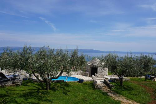 Holiday Home Marino with Private pool and Sea View - Apartment - Ravni