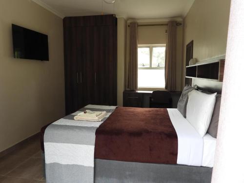 2 Bed Apt with en-suite and kitchenette - 2066, Хараре (фото 5)