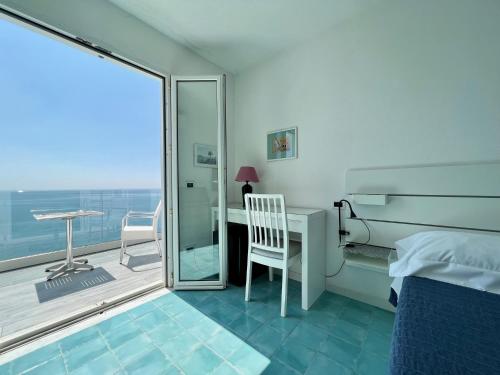 Deluxe Double Room with Balcony and Sea View room in Casa Sofia Boutique Hotel