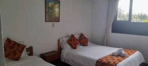 1 double bed, 1 twin bed
