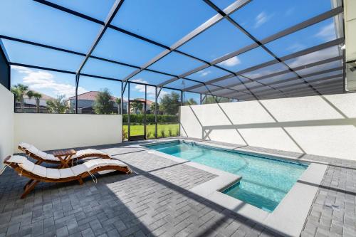 Sun Traveler Solterra by Shine Villas #113 townhouse in Davenport, USA