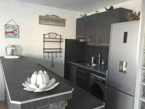 Küche, Appartement Vue Mer - RDC - Parking Privé - Meublé Tourisme 4 étoiles (Appartement Vue Mer - RDC - Parking Prive - Meuble Tourisme 4 etoiles) in Agde