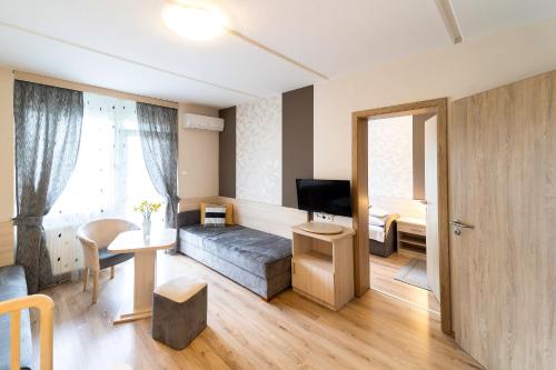 zonă comună salon/TV, Napfeny Hotel in Zalakaros