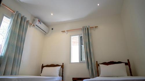 Tulia House - Hostel Room Type - Budget Double Room