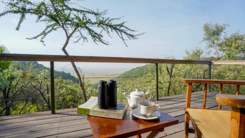 Mara Elatia Camp - Tap to explore photos