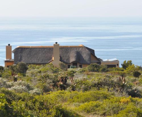 A szálláshely kívülről, Ocean View Cottage, Springerbaai in Boggomsbaai