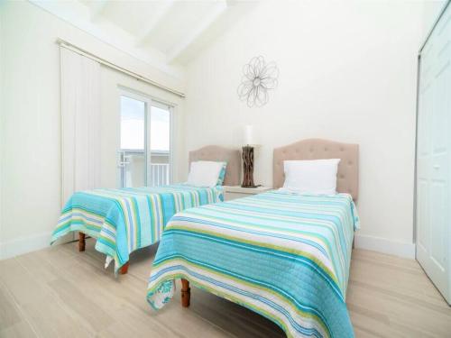 Sunset Cove # 303, West Bay (foto 6)