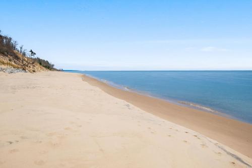 Lakefront House with Private Beach by Michigan Waterfront Luxury Properties