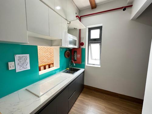 ห้องครัว, The Land Hotel & Apartment in เฟือง 2