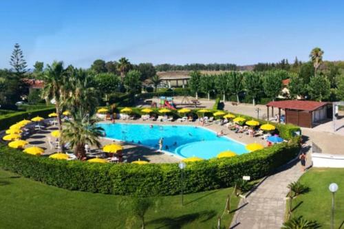  Metaponto. Appartamento in villaggio con piscina in Metapont