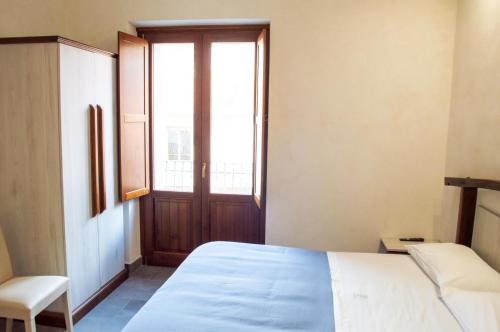 Palazzo Iaquinta - Luxury Rooms & Wellness