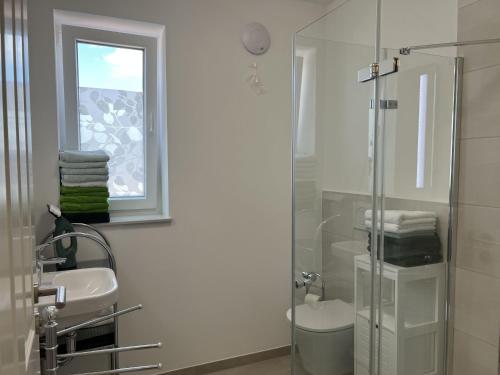 Bathroom, Ferienwohnungen EBBE und FLUT - Niedrigenergiehaus in Elpersbuttel
