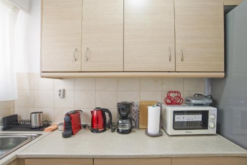 Andromaxi 2BR Apt near SNFCC AC WiFi - image 13