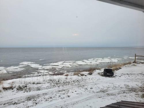 Kilátás, Le petit chalet de pierres in Sainte-Luce (QC)