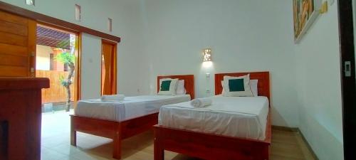 Tunjung guest house lovina beach in Lovina Beach
