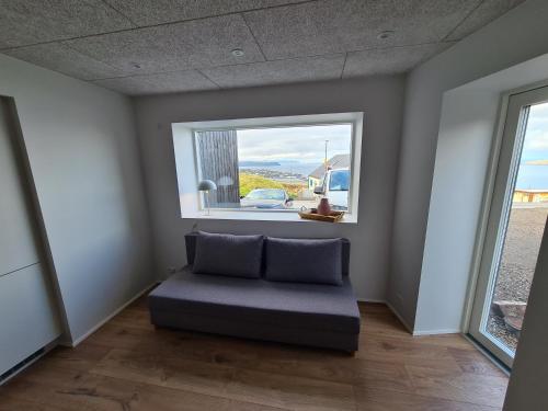 נוף, Klingurstjorn apartment - Modern 2 bedroom with stunning skyline views in Argir