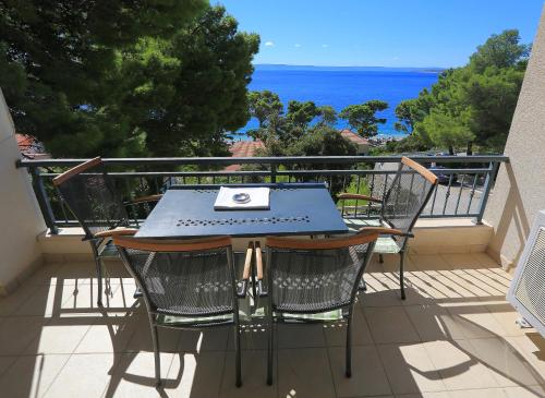 One-Bedroom Apartment with Balcony and Sea View