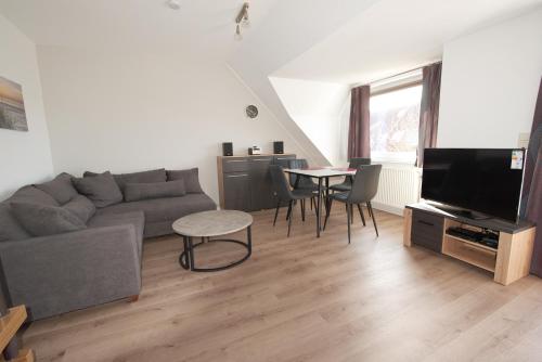 Apartment "Deichläufer" mit sonnigem Südbalkon Sauna und Parkplatz - 200m zum Deich in Dorum Neufeld, Deutschland