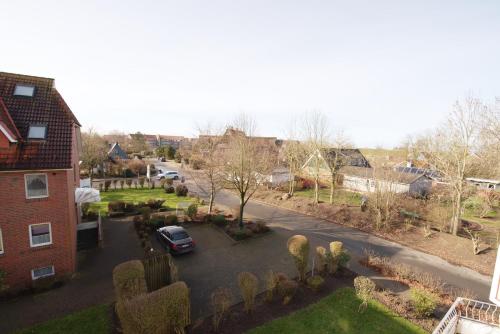 Apartment "Deichläufer" mit sonnigem Südbalkon Sauna und Parkplatz - 200m zum Deich in Dorum Neufeld, Deutschland
