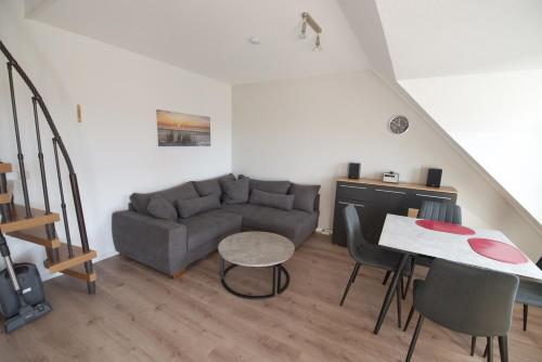 Apartment "Deichläufer" mit sonnigem Südbalkon Sauna und Parkplatz - 200m zum Deich in Dorum Neufeld, Deutschland