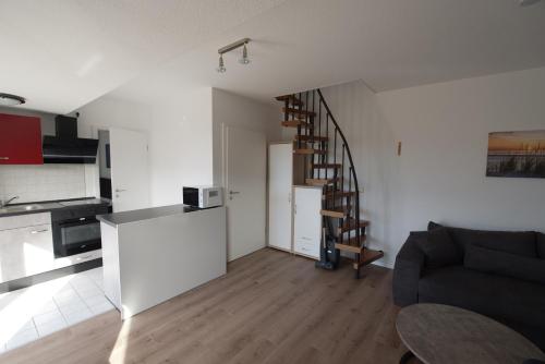 Apartment "Deichläufer" mit sonnigem Südbalkon Sauna und Parkplatz - 200m zum Deich in Dorum Neufeld, Deutschland