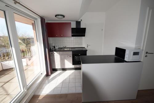 Apartment "Deichläufer" mit sonnigem Südbalkon Sauna und Parkplatz - 200m zum Deich in Dorum Neufeld, Deutschland