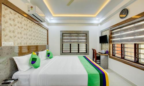 Superior Room With Living Area & Balcony room in Treebo Love Shore Residency 290 M From Lakeshore Hospital