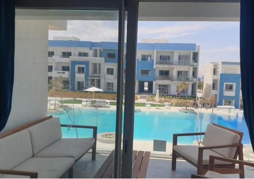 Exterior view, Fouka Bay North Coast 2BRs Modern Style Serviced Apartment with Open Pool & Sea View in Zawiyat Ailat Nuh