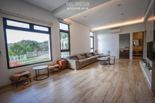 Skupni salon/TV območje, 印象莊園包棟民宿,一日一組客人,依人數開房 in Okrožje Xihu