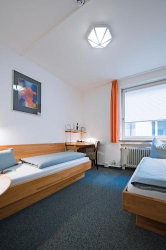 Chambre avec 2 lits