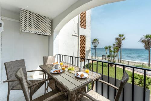 Dona Lola Micaela Beach front duplex apartment with open sea and beach views located between Marbell - Mijas Dona Lola Micaela Beach front duplex apartment with open sea and beach views located between Marbell - Mijas