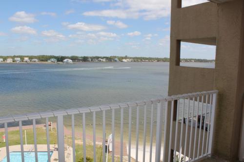 Compass Point 506 by ALBVR - Beautiful Lagoon-Front condo with great views, fishing pier, outdoor pool, indoor pool, and fitness room