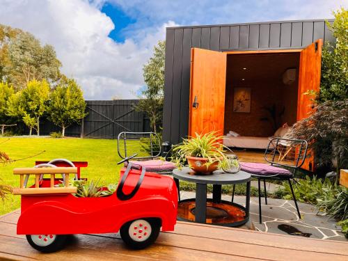 holiday tiny house near The Glen shopping center