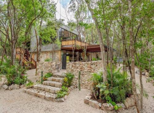 Cheerful cabin with pool surrounded by nature