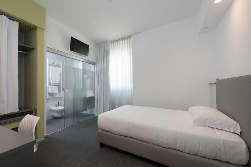 Executive Inn Boutique Hotel Set in a prime location of Brindisi, Executive Inn Boutique Hotel puts everything the city has to offer just outside your doorstep. The hotel offers a high standard of service and amenities to suit th