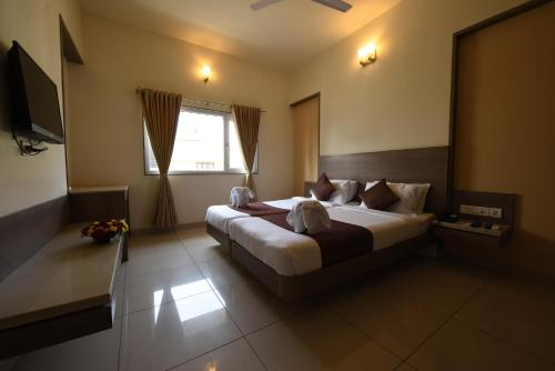 Hotel LandmarK Coimbatore in بي إن بالايام