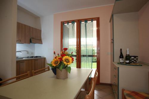  Terraced house with garden and porch in Rosolina Mare